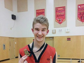 Holy Trinity Tiger and NBC touring team member William Smith, shown here celebrating after a win with his HTA team, will be heading to the U.K. in July as part of a touring team that will be tipping off against local British teams.