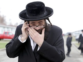 Uriel Goldman, community leader of the Lev Tahor in Chatham, begins the process of notifying community leaders the appeal was successful with the caveat the Chatham-Kent Children's Services will continue to do their work within the ultra-orthodox Jewish group. (Diana Martin/Chatham Daily News/QMI Agency)