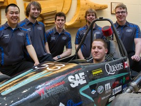 Joseph Liu (left), Lee McCay, Dalton Kellet, Scott McGill, Matt Ladouceur and Matthew Schmitt are senior members of the Queen's University Formula SAE team. On Monday, they revealed the Q14 vehicle at a presentation in the Beamish-Munro Hall at Queen's university. 
BRIANNE STE MARIE LACROIX/KINGSTON WHIG_STANDARD/QMIAGENCY