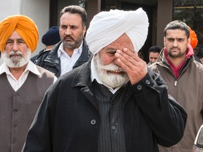 Ajit Singh, father of murder victim Jagtar Gill, is distraught as he leaves the Elgin Street courthouse on Monday April 14, 2014. He was there for a court appearance of his son-in-law Bhupinderpal Gill, who is charged with killing his wife, Jagtar Gill.
Errol McGihon/Ottawa Sun/QMI Agency