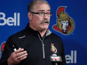 Senators head coach Paul MacLean talks to the media during locker clean-out day at the Canadian Tire Centre Monday. Darren Brown/Ottawa Sun