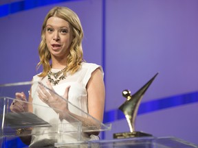 Adrianne Haslet-Davis, Boston Marathon bombing survivor, and amputee, receives a MedStar NRH Victory Award at Omni Shoreham Hotel on October 30, 2013 in Washington, DC. (Leigh Vogel/Getty Images for MedStar National Rehabilitation Network/AFP)