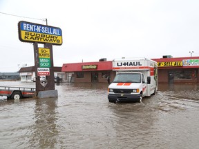 JOHN LAPPA/THE SUDBURY STAR 
Flooding occurred at a number of businesses on Notre Dame Avenue last April.