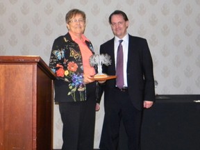 Gayle Bogart of Southwold receives her Syngenta 4-H Ontario Arbour Award at a ceremony in Waterloo in March. (Submitted photo)