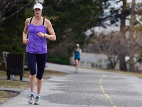 Just 24 hours after joggers were breaking out the sleeveless tops and shorts to run along the Rideau Canal, Ottawa will dip well into the "freezing" range on Tuesday. Expect rain, ice pellets, maybe freezing rain and snow today. (SARAH TAYLOR Ottawa Sun)