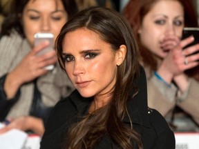 Former Spice Girls singer Victoria Beckham attends the world premier of the film "The Class of 92" in London December 1, 2013. (REUTERS/Neil Hall)