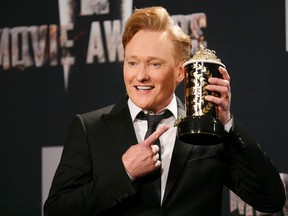 Show host Conan O'Brien poses backstage at the 2014 MTV Movie Awards in Los Angeles, California  April 13, 2014. (REUTERS/Danny Moloshok)