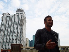 David Beckham talks to reporters at Miami Dade College in downtown Miami on March 24, 2014. A local group has come out against Beckham's plans to build a 25,000-seat soccer stadium on Miami's waterfront for the MLS team he will own. (Zachary Fagenson/Reuters/Files)