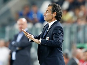 Italy's coach Cesare Prandelli gestures during his 2014 World Cup qualifying soccer match against Czech Republic at the Juventus stadium in Turin, September 10, 2013. (REUTERS/Stefano Rellandini)