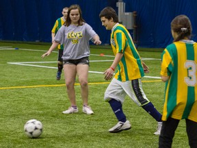Students from Loyalist Collegiate play a soccer match against Belleville’s Centennial Secondary School at the Four Corners Soccer Provincial Qualifier, hosted by Special Olympics Ontario on Tuesday at the Kingston 1000 Islands Sportsplex. (BRIANNE STE MARIE LACROIX/FOR THE WHIG-STANDARD)