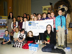 Members of the Murray Centennial School Early Act Club and supporters presented Free the Children with a cheque of $2,100 Tuesday. The money will go towards the purchase of bricks for a new school in India. 
Ernst Kuglin/The Trentonian