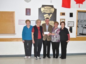 Whitecourt-Ste Ann MLA George VanderBurg surprised the board of the Whitecourt Seniors Circle with a cheque for $125,000 on Friday, April 11. The Seniors Circle will use the funds to help pay for a much needed addition to the building.

Barry Kerton | Whitecourt Star