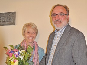 Dianne Josling (left) was presented with flowers by Rotary Club of Mitchell President John Hohner after the announcement that she was chosen the 2013 West Perth Citizen of the Year. KRISTINE JEAN/MITCHELL ADVOCATE