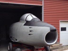The newly-restored Golden Hawk Sabre jet emerges from the restoration facility on its way to a storage hangar at the Sarnia airfield. SUBMITTED PHOTO
