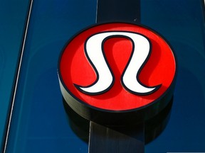 A Lululemon Athletica logo is seen outside one of the company's stores in New York, in this December 16, 2013 file photo. (REUTERS/Shannon Stapleton/Files)