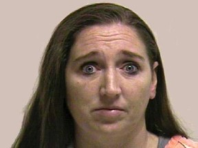 Megan Huntsman is shown in this booking photo provided by the Pleasant Grove County Jail in Pleasant Grove, Utah April 13, 2014.   REUTERS/Pleasant Grove County Jail/Handout