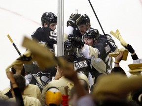 Beau Bennett of the Pittsburgh Penguins celebrates his second period goal against the Columbus Blue Jackets in Game 1 at Consol Energy Center on April 16, 2014. (Justin K. Aller/Getty Images/AFP)