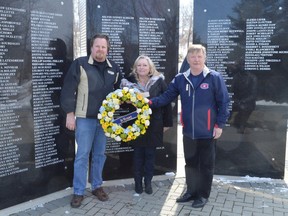 KEVIN McSHEFFREY/QMI Agency
Marty Warren, USW District 6 director; Sylvia Boyce, USW District 6’s co-ordinator of health, safety and environment; and Steve Hunt, USW District 3 director, placed a wreath at the Miners’ Memorial in Elliot Lake to remember those who lost their lives while on the job or because of it.