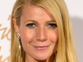 U.S. actress Gwyneth Paltrow poses at the British Fashion Awards in London December 2, 2013. (REUTERS/Neil Hall)