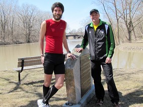 Colin Goudreau, left and Steve Moore, posing at the Thames Grove Conservation Area, are among the local participants in the 2014 Boston Marathon.