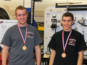 Portage Collegiate Institute student Tyson Hofer, left, finished in fourth place in his automotive service category at Skills Canada Nationals June 4-7 in Toronto, just 0.8 per cent out of third spot and 1.8 per cent out of top spot. (Johnna Ruocco/THE GRAPHIC/QMI AGENCY)