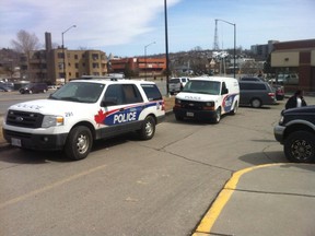 The Greater Sudbury Police Service was on scene at the Tim Hortons on Cedar Street Thursday afternoon. A witness says three men attempted to rob a fourth in the fast food chain's washroom. Laura Stricker photo.