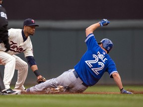 Minnesota Twins shortstop Pedro Florimon tags out Toronto Blue Jays catcher Josh Thole during an attempted steal at second base in the fifth inning at Target Field. (Jesse Johnson/USA TODAY Sports)