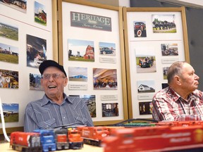 Ted Watson(left) and Dan Campbell (right) run the Heritage Acres stand during the Volunteer Luncheon and awards ceremony on Friday, April 11. John Stoesser photo/QMI Agency