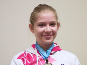 Shaleisa Sawchuk and her provincial medals and plaque from 2014. - Gord Montgomery, Reporter/Examiner