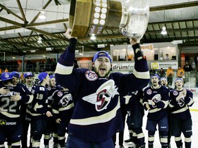 It was a time for celebration for Geoffrey Crissfield and the members of the Spruce Grove Saints, after they captured the Gas Drive Cup, emblematic of the Alberta Junior Hockey League’s championship, with a thrilling 2-1 overtime win over the Dragons in Drumheller on April 15. - Gord Montgomery, Reporter/Examiner