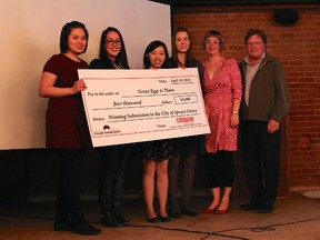 University of Alberta students Victoria Pham, Jenna Hutton, Jessica Lui and Anika Drost stand with Spruce Grove staff Lindsey Butterfield and Jeff Mustard after winning the 2014 Vibrant Communities Contest on April 10. - Photo Supplied