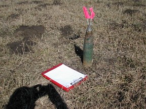 The Enoch Creen Nation are claiming that live munitions like this one, a 105mm artillery shell, uncovered on the Indian Lakes Golf Course, are still underground at the public facility. As such, the golf course and the cultural grounds to the south of the course have been closed down indefinitely until it can be determined whether or not this is actually the case. - Photo Supplied