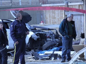 Homeowners Allen and Sharen Vidler survey their damaged home. A single car left RCMP and neighbours in awe of its extensive destruction on April 10 in Spruce Grove. The white vehicle, moving at an excessive speed, drove up an embankment and through three fences — removing a portion of one home’s kitchen. - Karen Haynes, Reporter/Examiner