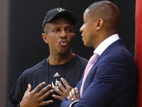 Raptors GM Masai Ujiri (right) said he’s lost no sleep over talk that the Nets lost their last two games to get to face them in the first round. Coach Dwane Casey added that the Nets would’ve had to know the results of other games for it to work. (Craig Robertson, Toronto Sun files)