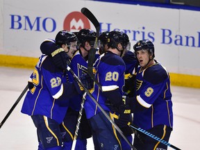St. Louis Blues forward Jaden Schwartz (9) is congratulated after scoring a goal against the Chicago Blackhawks during Game 1 of the first round of the Stanley Cup playoffs at the Scottrade Center. (Scott Rovak/USA TODAY Sports)