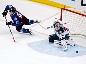 Colorado Avalanche captain Gabriel Landeskog (92) has his shot stopped by Minnesota Wild goalie Llya Bryzgalov during Game 1 of their first-round playoff series at Pepsi Center. (Chris Humphreys/USA TODAY Sports)