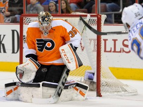 Philadelphia Flyers goalie Steve Mason (35) makes a save on St. Louis Blues left wing Alexander Steen (20) during the first period at Wells Fargo Center on Mar 22, 2014 in Philadelphia, PA, USA. (Eric Hartline/USA TODAY Sports)