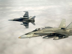 Canadian Forces CF-18 fighter jets take part in military exercises near Keflavik, Iceland April 5, 2013. REUTERS/Cpl Pierre Habib/Canadian Armed Forces/handout via Reuters