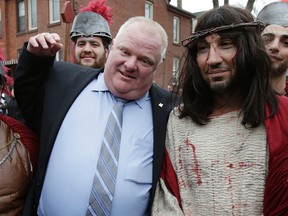 Mayor Rob Ford with "Jesus" during the Good Friday procession -- NOT the Jesus in the City Parade -- in Little Italy April 18, 2014. (Craig Robertson/Toronto Sun)
