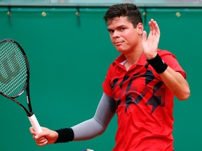 Milos Raonic of Canada reacts after missing a point during his match against Stanislas Wawrinka of Switzerland during their quarter-final match at the Monte Carlo Masters in Monaco April 18, 2014. (REUTERS/Eric Gaillard)
