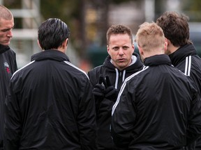 Ottawa Fury FC head coach Marc Dos Santos talks with his leadership group prior to a training session at Carleton University. The team plays it's first ever home game on Saturday. April 18,2014. Errol McGihon/Ottawa Sun/QMI Agency