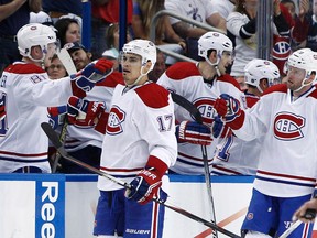 Montreal Canadiens left wing Rene Bourque (17) celebrates with teammates after scoring a goal against the Tampa Bay Lightning during the second period in game two of the first round of the 2014 Stanley Cup Playoffs at Tampa Bay Times Forum on Apr 18, 2014 in Tampa, FL, USA . (Kim Klement/USA TODAY Sports)