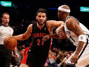 Toronto Raptors point guard Greivis Vasquez drives around Brooklyn Nets shooting guard Jason Terry during the first quarter at Barclays Center. (Anthony Gruppuso-USA TODAY Sports)