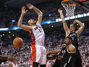 Jonas Valanciunas is fouled in Game 1 against the Brooklyn Nets on April 19. (USA Today Sports)