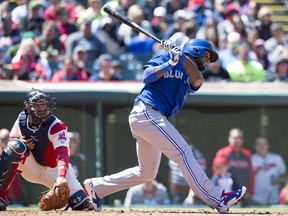 Jose Reyes #7 of the Toronto Blue Jays hits an RBI single during the second inning against the Cleveland Indians at Progressive Field on April 19, 2014 in Cleveland, Ohio.  (Jason Miller/Getty Images/AFP)