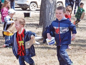 Three-year-old Josh Dick, left, and Maddox Bennet, 5, were among roughly two dozen young children to come out for the Village of Milo’s inaugural Easter egg hunt on Saturday afternoon at the community’s park.