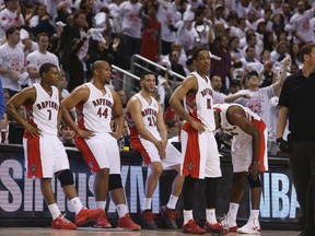 The Raptors during a timeout in Game 1 of their playoff series against the Brooklyn Nets on April 19. (Veronica Henri, Toronto Sun)
