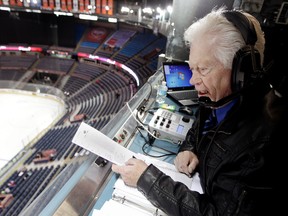 Bob Ridley calls the Medicine Hat Tigers game. He also drives the Tigers’ team bus. (David Bloom, Edmonton Sun)