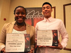 Kyanna Giles (left) and Joseph Medrano show off their awards at the Basketball Manitoba awards banquet, Saturday at the Victoria Inn in Winnipeg.
Ian Froese/Winnipeg Sun