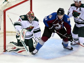 Colorado Avalanche left wing Gabriel Landeskog attempts a shot on Minnesota Wild goalie Ilya Bryzgalov during Game 2 of their Western Conference quarterfinal series at the Pepsi Center in Denver, April 19, 2014. (RON CHENOY/USA Today)
